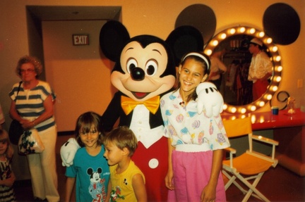 posing with Mickey